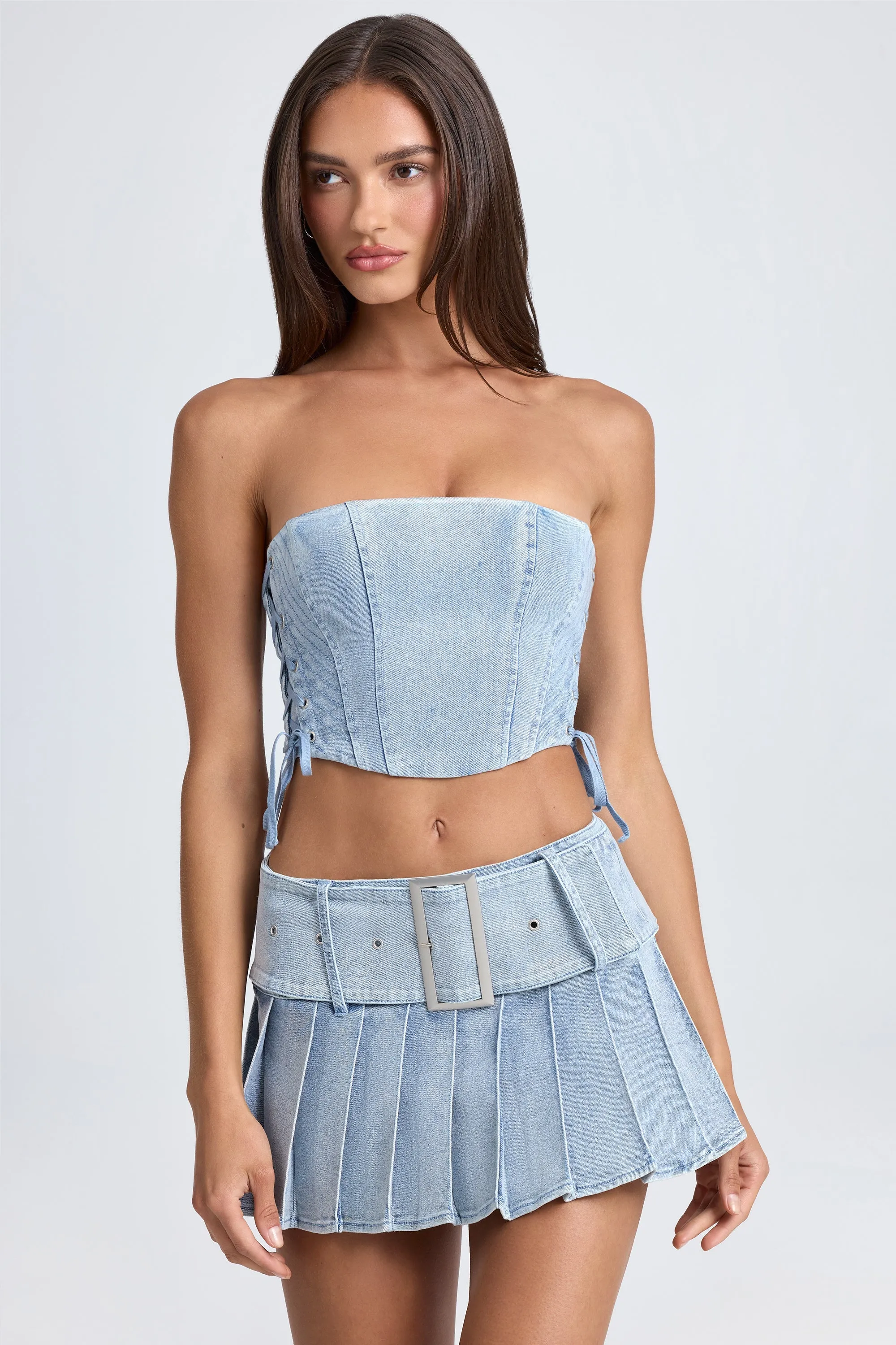 Belted Pleated Low-Rise Micro Mini Skirt in Light Blue Stonewash